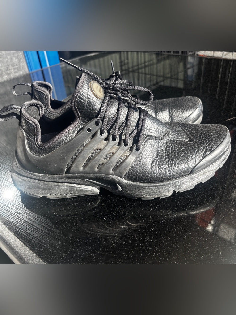 Nike All-Black Leather Athletic Shoes